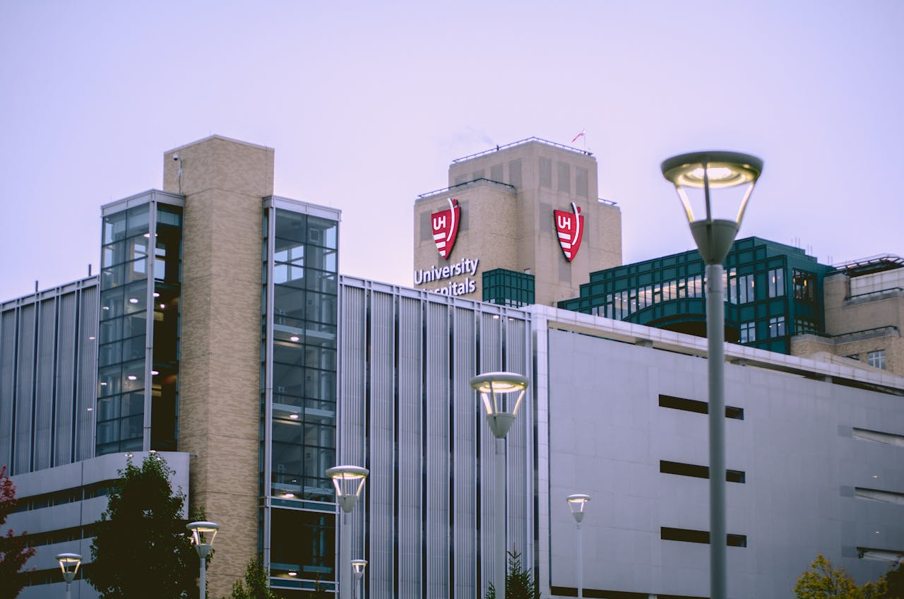 View of University Hospitals building in Cleveland, OH against a clear sky.